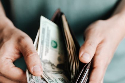 Man looking in his wallet