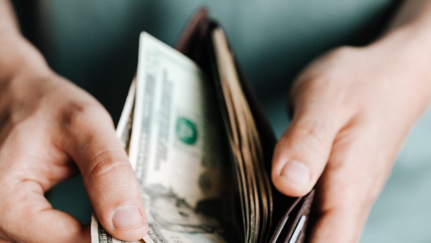 Man looking in his wallet