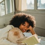 Black woman reading a book