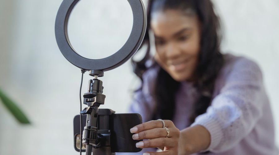 Smiling woman creating a Video
