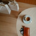 shopping bags and coffee on a table